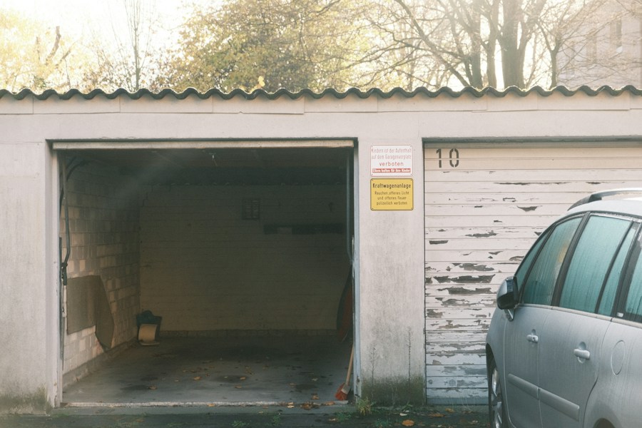 Before: Great Neck house garage with no charging point on the bare wall